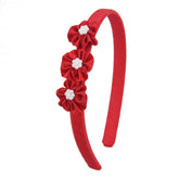 7Rainbows Boutique triple satin flowers red headband with pearls for a princess-perfect party look.