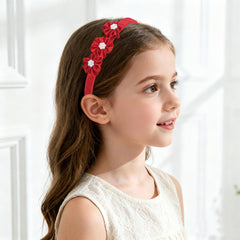 7Rainbows headband showcases pearls and satin bows for elegant everyday dress-up.