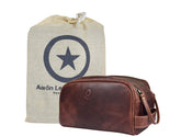 Aaron Leather Goods Vendimia Estilo leather toiletry bag close-up in dark brown for organized travel.