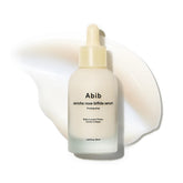Abib Jericho Rose Serum bottle close-up showing barrier care and hydration benefits.