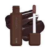 About Face Matte Fluid Eye Paint applicator closeup showing precise pigment application