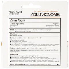 Acnomel tinted cream bottle on vanity with neutral lighting.