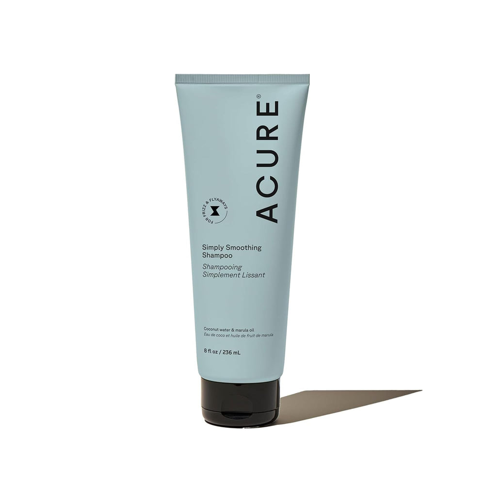 Acure Simply Smoothing Shampoo bottle showcasing hydrating formula for smoother, frizz-free hair.