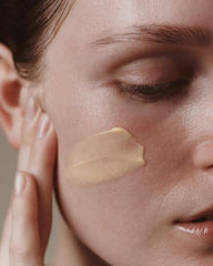 Aesop Camellia Nut Cream texture on skin suggests a hydrated matte finish