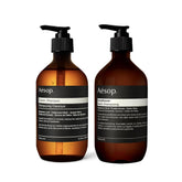 Aesop Classic Shampoo bottle with cedarwood and juniper for hydrated hair.