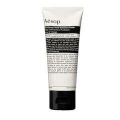 Aesop Purifying Facial Exfoliant Paste bottle showing gentle exfoliation with quartz for smoother skin.