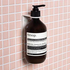 Aesop Resurrection Aromatique Hand Wash ingredients close-up features mandarin rind and rosemary for skin-friendly cleansing.