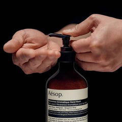 Aesop Reverence hand balm swatch highlights nourishing shea butter and macadamia oil.