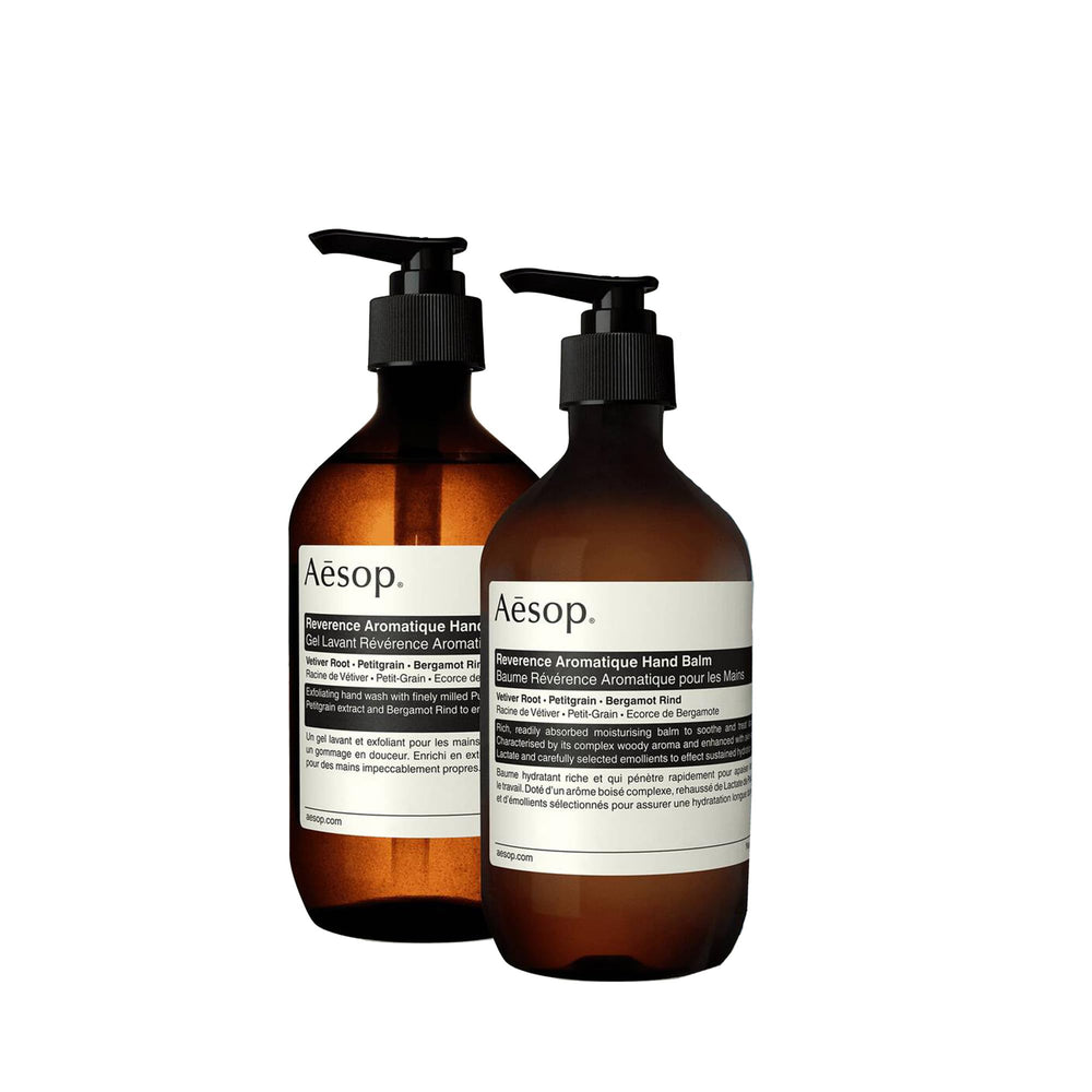 Aesop Reverence hand wash bottle pours for a gentle cleansing ritual that refreshes hands.