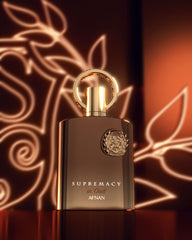 Afnan Supremacy in Oud bottle-angle highlights elegant glass and aroma promise.