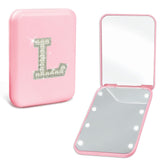 Aganmi pearl initials pink travel mirror showcases personalized initials for on-the-go style.