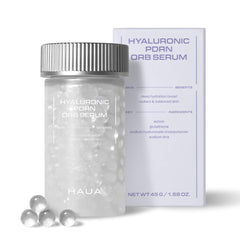 HAUA Hyaluronic PDRN orb serum beads close-up delivering fresh actives for radiant skin.