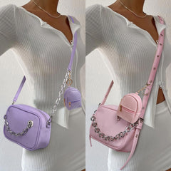 AIBFRID mini backpack keychain in gray, front view, durable PU leather protects essentials on the go.