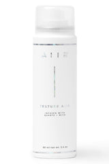 AIIR Texture Hair Styling Spray bottle closeup adds shine and texture.