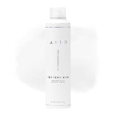AIIR Texture Styling Spray bottle closeup highlighting lift and natural shine.