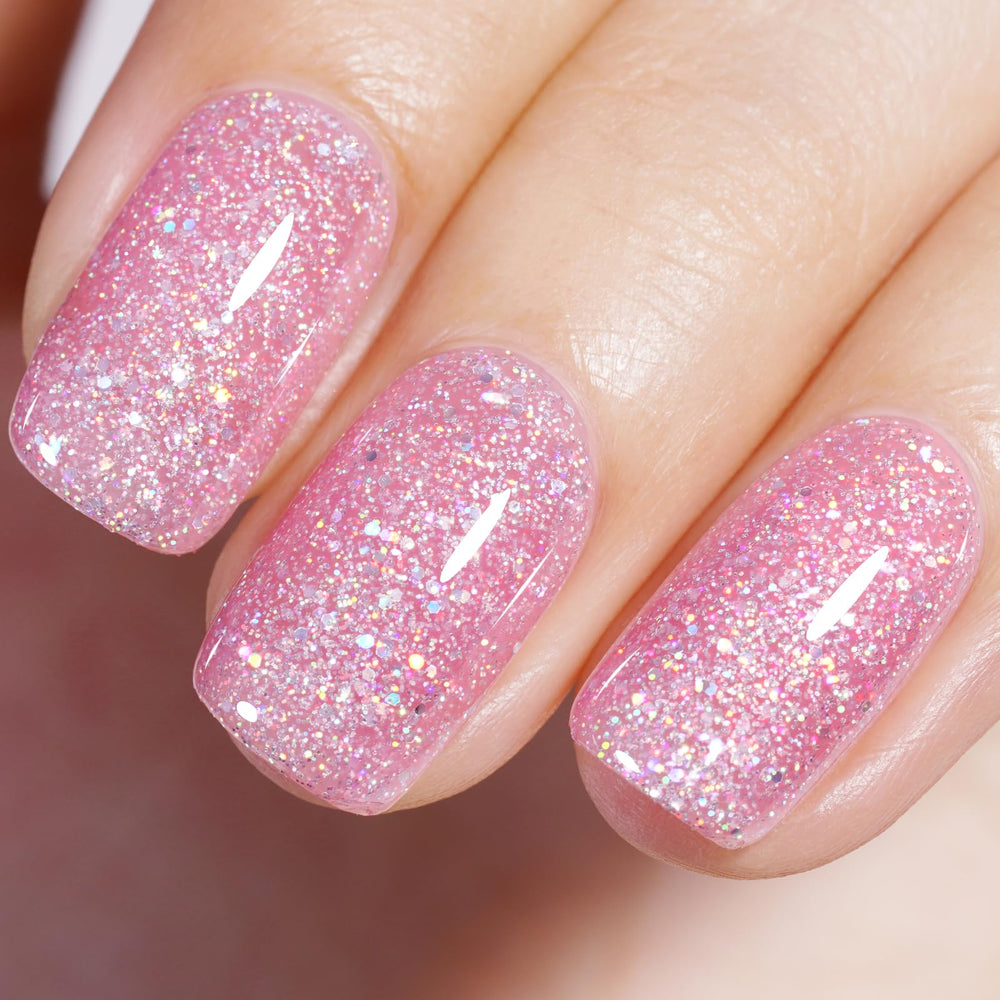 AILLSA Pink Glitter Gel Nail Polish bottle closeup showing iridescent sparkle for chic nails.
