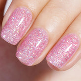 AILLSA Pink Glitter Gel Nail Polish bottle closeup showing iridescent sparkle for chic nails.