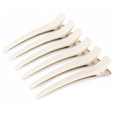 AIMIKE desert titanium 4.8-inch clip close-up shows extended grip for thick hair.