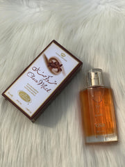 Al-Rehab Choco Musk spray close-up highlighting long-lasting aroma for reapplication