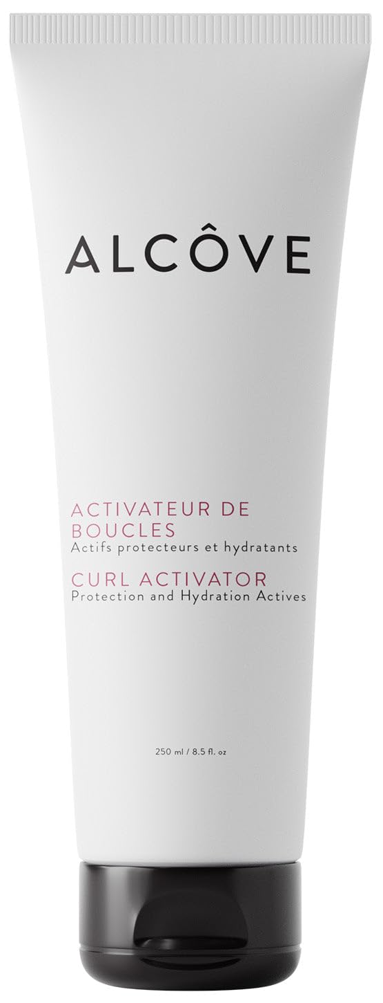 Alcôve Curl Activator bottle pour shows anti-frizz and defined waves in action.