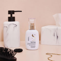 ALFAPARF MILANO Semi di Lino Diamond bottle on hair shows shimmering shine.