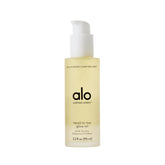 Alo Head-to-Toe Glow Oil bottle ready for glow-boosting hydration
