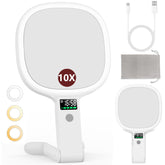 Alovely travel makeup mirror with light on desk for everyday makeup use.