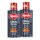 Alpecin C1 bottle pour demonstrates energizing scalp care for a refreshed cleanse.