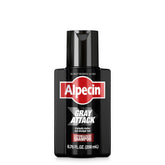 Alpecin Gray Attack shampoo bottle close-up showing natural grey coverage potential