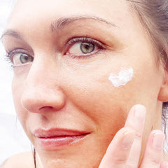 Alpha Essential Renewal Lotion texture closeup reveals creamy, fragrance-free formula