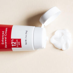 Alpha Skin Care Enhanced Renewal Cream texture swirl illustrates creamy, fast-absorbing moisture.