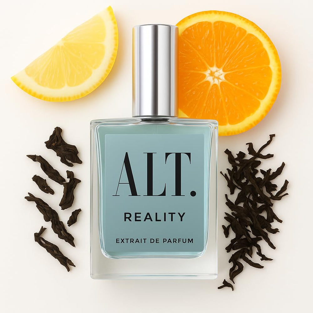 ALT. FRAGRANCES Reality bottle close-up highlighting citrus and tea notes for everyday confidence and presence.