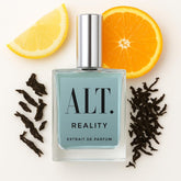ALT. FRAGRANCES Reality bottle close-up highlighting citrus and tea notes for everyday confidence and presence.