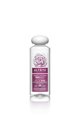 Alteya Rose Water bottle pours for refreshing facial toning and skin hydration.
