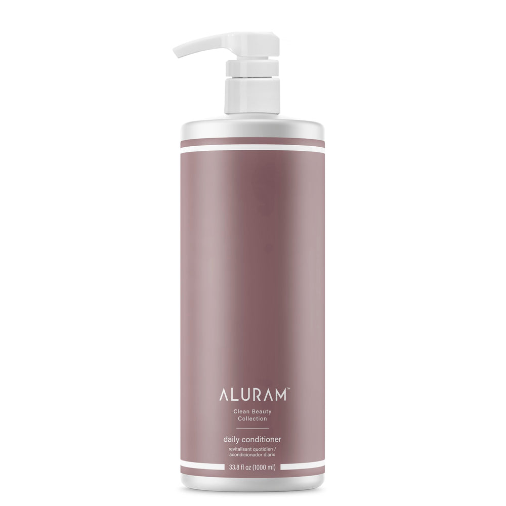 ALURAM Coconut Water Daily Conditioner bottle promotes hydration and shine for all hair types.
