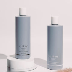 ALURAM Coconut Water Shampoo lather demonstrating cleansing power.