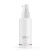 ALURAM Coconut Water Shine Serum bottle closeup shows frizz control and radiant gloss