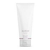 ALURAM Coconut Water Styling Cream bottle front for hydrated, frizz-free definition.