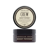 American Crew Boost Powder bottle dispense highlights weightless lift for men's hair.