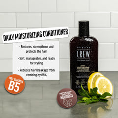 American Crew conditioner massaged into hair to detangle and hydrate.