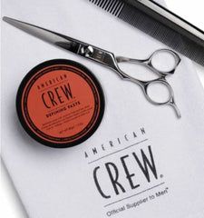 American Crew Defining Paste on hair achieving matte finish without shine.