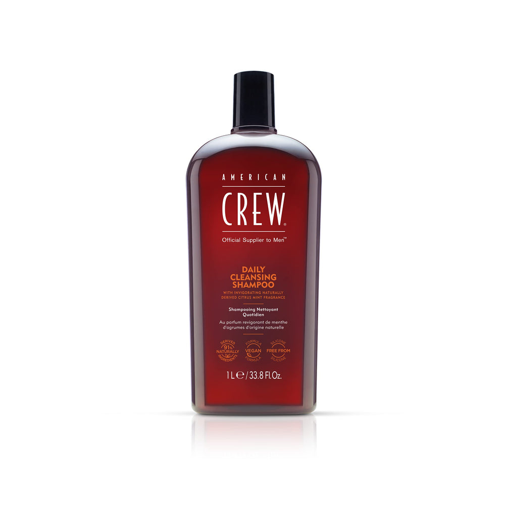 American Crew Daily Cleanser bottle highlighting refreshing citrus mint aroma for daily hair cleansing and moisture