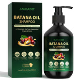 AMOADO Batana Oil Shampoo bottle demonstrates gentle cleansing for thicker, healthier hair.