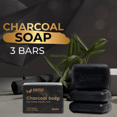 AMVital charcoal soap close-up showing textured charcoal and creamy lather.