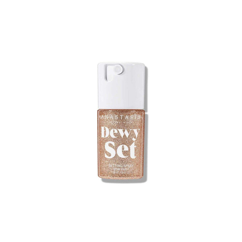 Anastasia Beverly Hills Mini Dewy Set setting spray bottle delivers hydrating radiance.