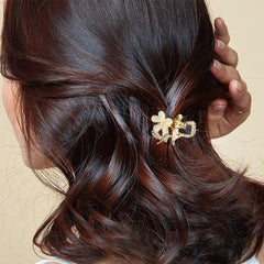 ANBALA five-leaf flower design mini clip adds elegant detail to updos.