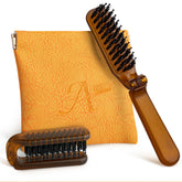 Ancable folding travel brush shown in compact form for on-the-go styling