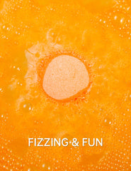 Aofmee bath bombs fizz-action photo shows the bath transforming with scent release