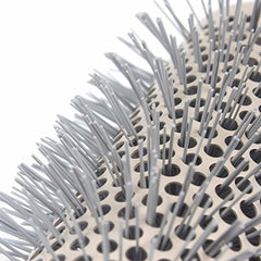 Aozzy round brush 32mm for balanced volume and sleek styling.