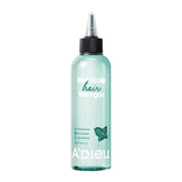 A'PIEU Mint Hair Vinegar bottle closeup demonstrating refreshing scalp cleansing benefits.